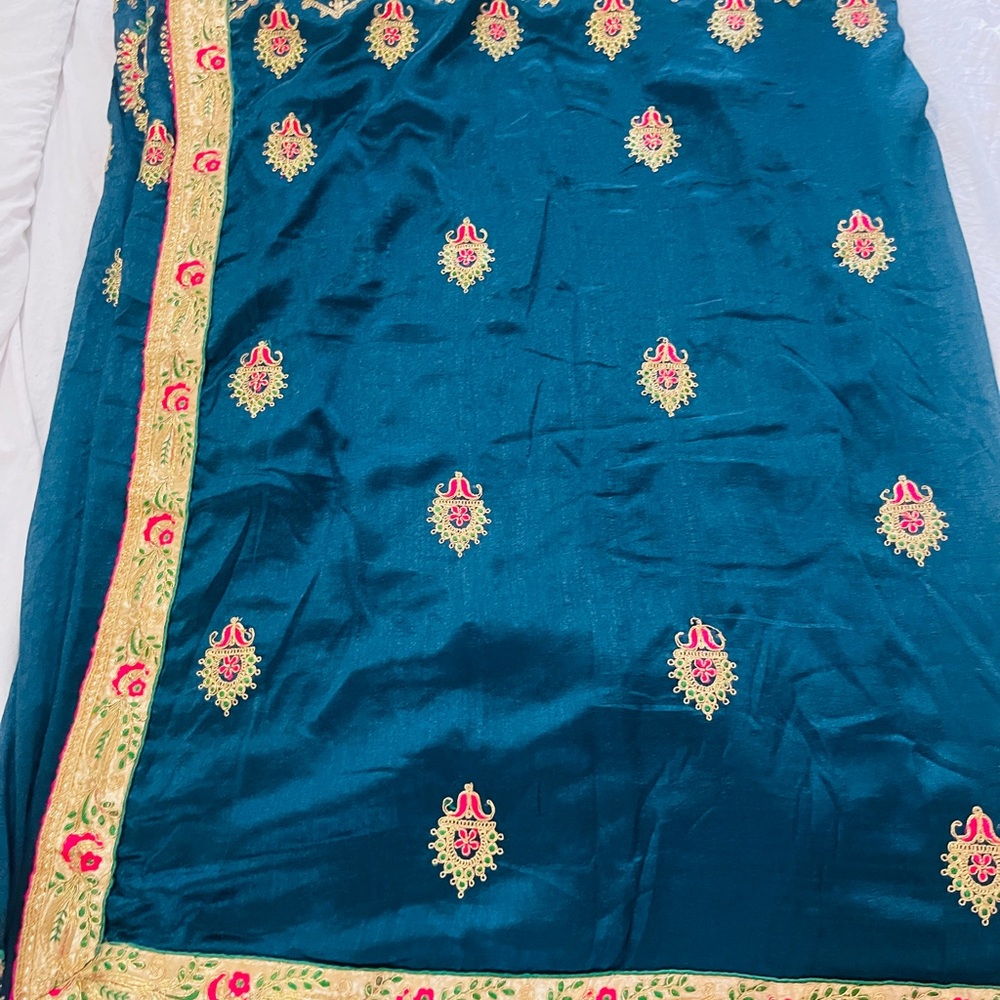 Teal Embroidered Fabric with Gold and Pink saree with blouse pic